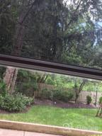 картинка 1 прикреплена к отзыву Солнечная пленка 35,6 X 78,7 дюймов: неклейкая, терморегулирующая, солнцезащитная, односторонняя, зеркальная, тонированная, для дома и офиса - черный от Sean Chase