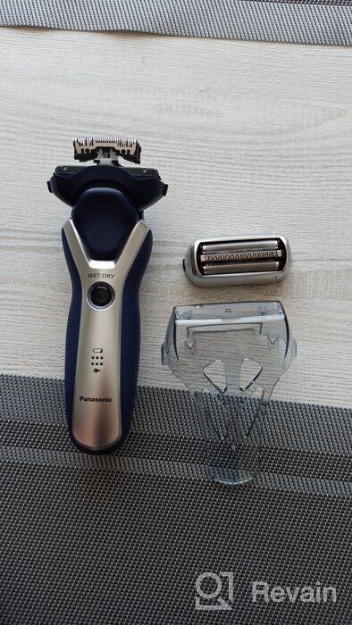 img 1 attached to Panasonic ES-RT37 electric shaver, blue/silver review by Nguyn Hong Qun (Qun ᠌