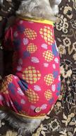 картинка 1 прикреплена к отзыву ❤️ KYEESE Valentine's Day Dog Pajamas: Pink Heart Patterned PJs for Small Dogs - Soft, Stretchable Velvet Onesie for Holiday Comfort от Jared Barit