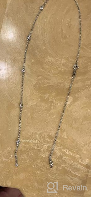 img 1 attached to Stunning Amazon Essentials Sterling Silver AAA Cubic Zirconia Station Necklace – Sparkle with Elegance! review by Ken Pinell