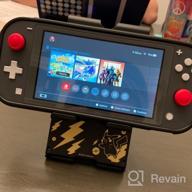 img 1 attached to Officially Licensed Nintendo & Pokemon Pikachu Playstand For Switch - Compact And Stylish In Black & Gold review by Charles Mistretta