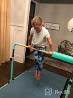 img 1 attached to SGS Approved 5Ft/6Ft No Wobble Gymnastics Kip Bar With Fiberglass Rail & 304 Stainless Steel Regulating Arms - Adjustable Height 3'-5' review by Jason Fanney