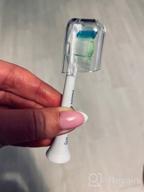 img 1 attached to 💎 Set of 4 Philips Sonicare HX6064/10 Best White W2 Brush Heads with BrushSync for Effective Teeth Whitening review by Agata Siejwa ᠌