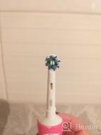 img 1 attached to 💡 4 Pack of Oral-B Cross Action Electric Toothbrush Replacement Brush Heads review by Seo Jun ᠌