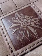 img 1 attached to Men's Accessories: 💼 JINX Witcher Medallion Bi-Fold Wallet review by Tyler Fountas
