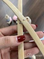 img 1 attached to Rotating Wooden Crib Mobile With Nut And Bead Accents For Baby Girls' Ceiling Nursery Décor review by Melissa Sanchez