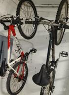 картинка 1 прикреплена к отзыву Voilamart Bicycle Wall Mount Hanger - Pack Of 4 Bike Storage Hooks For Garage Shed, 66Lb Max Capacity Per Single Bike от Chad Baio