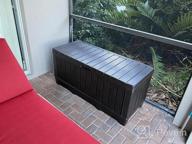 img 1 attached to Stay Clutter-Free Outdoors With Keter Kentwood 90 Gallon Resin Deck Box In Brown review by Kim Fukushima