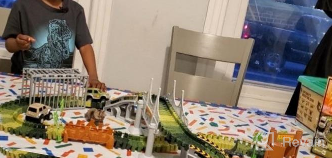 img 1 attached to 159 Pcs Dinosaur Glow In The Dark Race Train Track Toy For Boys & Girls Ages 3-7 | DinoManiacs By JitteryGit review by Michael Reddy