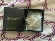 img 1 attached to Stylish and Hypoallergenic: 10 Pairs Small Stainless Steel Hoop Earrings Set for Women, Nickel-Free and Allergy-Free, Silver and Gold, 10MM-18MM review by Adam Davidson