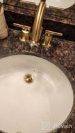 img 1 attached to Matte White Bathroom Faucet With 2 Handles, 360° Swivel Spout, And Metal Overflow Pop-Up Drain - 8 Inch Widespread Vanity Faucet Made Of Brass, By TRUSTMI review by David Thornton