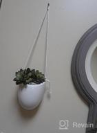 img 1 attached to Modern And Chic: Set Of 3 Ceramic White Hanging Planters With Jute Rope For Indoor Succulent Plants review by Sabrina Moore