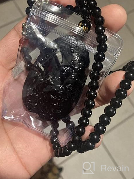 img 1 attached to 🌟 Stylish Pure Natural Obsidian Pendant Necklace with Intricate Crystal Pattern – Ideal for Men and Women review by Corey Soto