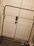 img 1 attached to White Freestanding Garment Rack With Top Rod, Lower Storage, And 6 Hooks By UDEAR review by Sean Andrews