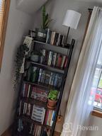 картинка 1 прикреплена к отзыву Rolanstar 6-Tier Black Bookshelf With Industrial Style And Vintage Charm - Perfect For Living Room Or Bedroom от Tom Lawson