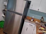 img 1 attached to Black Winia 18 Cu. Ft. Top Mount Refrigerator With Built-In Ice Maker review by Leo Puente