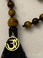 img 1 attached to 108 Mala Beads Necklace Hand Knotted Tassel Charm OM COAI review by Sarah Smith