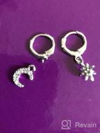 img 1 attached to Yfstyle Huggie Earrings Silver Butterfly review by Marcus Krieger