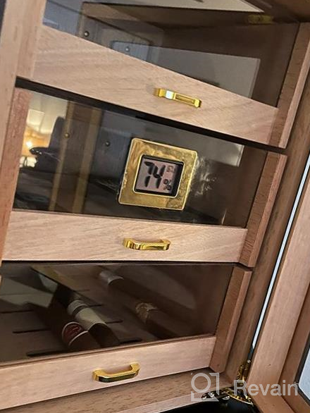 img 1 attached to Cigar Aficionados Rejoice: Woodronic'S Digital Humidor Cabinet For 100-150 Cigars, Spanish Cedar Lining, And 2 Crystal Gel Humidifiers In A Glossy Ebony Finish - Perfect Gift For Fathers! review by Brad Davis