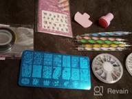 img 1 attached to Complete Nail Art Kit With Flower And Animal Stamping Plate, Acrylic Rhinestones, Mandala Dotting Pens, Holographic Striping Tape And Pink Stamper Scraper review by Mandy Martin