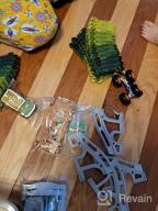 img 1 attached to 159 Pcs Dinosaur Glow In The Dark Race Train Track Toy For Boys & Girls Ages 3-7 | DinoManiacs By JitteryGit review by Bohyun Rossetti