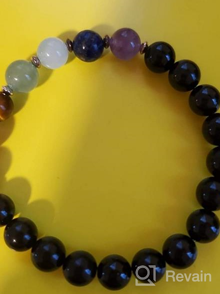 img 1 attached to Cherry Tree Collection Chakra Stretch Bracelet: Genuine 8mm Gemstones, Sterling Silver Spacers. Perfect for Men/Women. Choose from Small, Medium, or Large Sizes! review by Mike Woolford