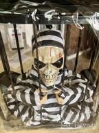 img 1 attached to Halloween Animatronic Talking Prisoner Decoration With Motion Sensor And Light - Spooky Indoor/Outdoor Prop For Kids And Adults | Clearance Halloween Décor review by Cory Jacobson