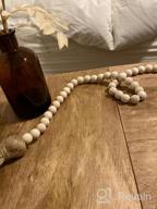 img 1 attached to Add Rustic Charm To Your Home With EasyBravo'S 58 Inch Wood Bead Garland review by Veronica Holmes