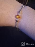 img 1 attached to Sterling Silver Celtic Bracelet with Amber Knot: Adjustable Irish Jewelry Gift for Women, Girls - Perfect for Christmas, Birthdays! review by Dee Mills