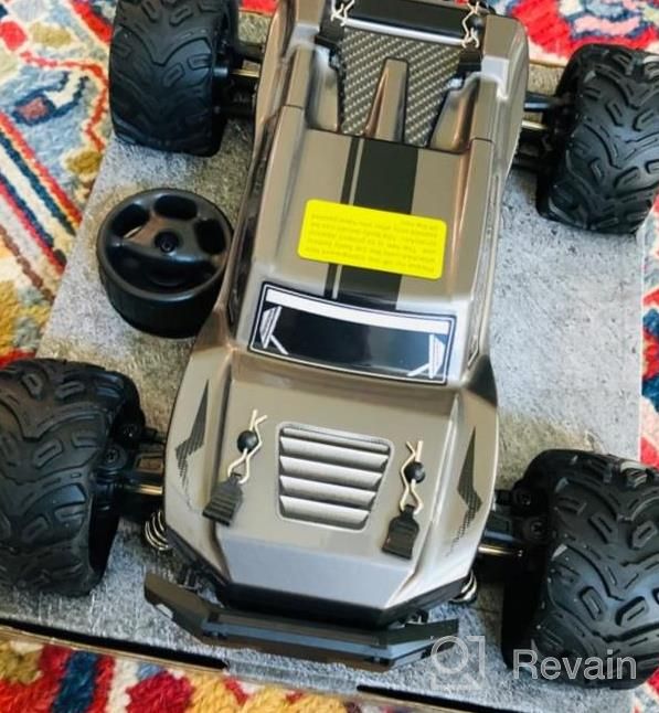 img 1 attached to Experience Thrilling Off-Road Adventures With HAIBOXING 1:18 Scale RC Car 18868 – High-Speed Waterproof All Terrain Truck For Kids And Adults. Two Batteries Provide 40 Minutes Of Non-Stop Playtime! review by Marcela Taylor