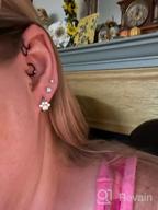 img 1 attached to Stylish And Hypoallergenic Sterling Silver Cubic Zirconia Earrings With Adorable Dog And Cat Paw Designs review by Chris Cervantes