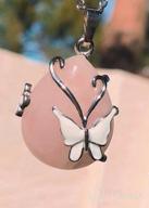 img 1 attached to 💎 Vintage Wire Wrap Butterfly Pendant Necklace with Healing Crystals - Rose Quartz, Amethyst, and Opalite by Bivei review by Sherrill Jensen