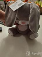 img 1 attached to Bundaloo Peek-A-Boo Bunny Animated Musical Plush Toy - Moving Floppy Ears & Glowing Heart - Plays Peek-A-Boo & Sing Do Your Ears Hang Low - Interactive Grey Singing Stuffed Bunny For Boys & Girls review by Paul Vanlaere