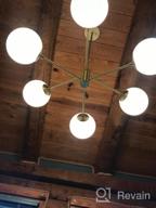 картинка 1 прикреплена к отзыву Liara Caserti Black Sputnik Chandelier - Modern Ceiling Light with 6 Glass Globe Lights - Mid Century Modern Chandelier for Dining Room, Kitchen, Bedroom - Sputnik Light Fixture, UL Listed от Thunder Ballman