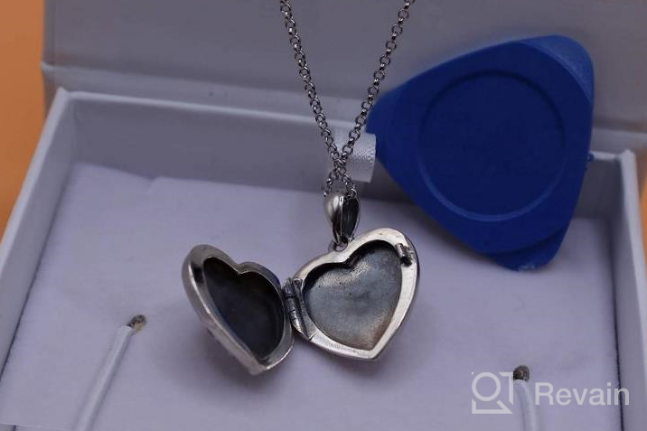 img 1 attached to Personalized Sterling Silver Heart Locket Necklace With Adorable Animal Charms: Koala, Panda, Otter, Cat, Wolf, Elephant - Holds Two Pictures review by Steven Emberling