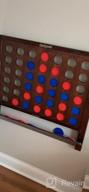 img 1 attached to Enhance Your Game Room With GoSports Wall Mounted Jumbo Four In A Row Game + Coins review by Jenna Morocho