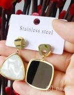 img 1 attached to Gold Plated Geometric Statement Earrings for Women and Girls - Black and White Dangle Drop Fashion Jewelry review by Juanita Vipond