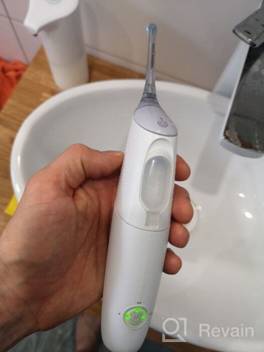 img 2 attached to Enhanced Dental Care: Philips 🦷 Sonicare Airfloss Ultra, HX8432/13, Black Edition review by Aneta Dziecitkowska ᠌