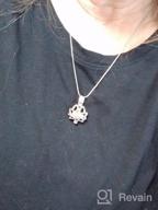 картинка 1 прикреплена к отзыву Ожерелье с подвеской в форме цветка лотоса для хранения праха от Laura Brooks