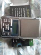 img 1 attached to Scales jewelry, kitchen, pocket electronic with backlight Pocket Scale 0.01g - 200g review by Edyta Tulwin ᠌