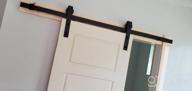 img 1 attached to SKYSEN 5FT Single Sliding Barn Door Hardware Kit, Track System For 1/4” Thick Material - 4FT-13FT Available - Smooth And Quiet Operation - Easy Installation - Black (J Shape) review by Carl Mayes