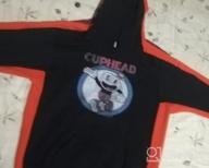 img 1 attached to 🎮 Cuphead Retro Black Circle Hoodie for Boys' Apparel review by Matt Tbone
