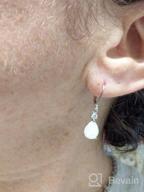 img 1 attached to FEELDAN Premium 14K Gold Plated White Opal Teardrop Lever-Back Dangle Earrings - Hypoallergenic Jewelry review by Azizah Jefferson