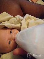 картинка 1 прикреплена к отзыву Realistic Lifelike Full Silicone Baby Doll - Boy With Closed Eyes: 18-Inch Sleeping Newborn Lookalike, Not Vinyl от Srivatsan Oling