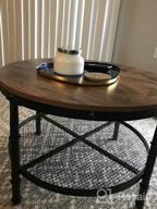 img 1 attached to Rustic Small Round Coffee Table With Storage, Wood Surface Top And Metal Legs, 2-Tier Shelf, Ideal For Living Room, Space-Saving Design In Brown review by Kristin Lee