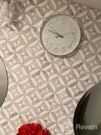 картинка 1 прикреплена к отзыву Modern 12" Battery Operated Silent Wall Clock - Decorative For Office, Kitchen, Living Room, Bedroom & Bathroom | Jomparis Plastic Frame Glass Cover (Silver Arabic Numeral) от Adrian Garcia