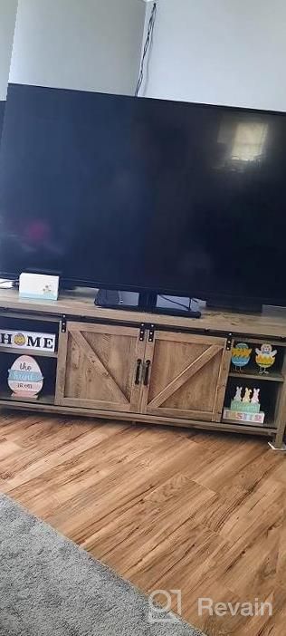 img 1 attached to Rustic Gray Wash Catrimown Farmhouse TV Stand With Sliding Barn Door For 65 Inch TV - Entertainment Center And Media Console Stand For TVs Up To 65+ review by Courtney Collins