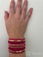 img 1 attached to 💖 The Vibrant Pink and Elegant Gold Bead Tribal Spiral Cuff Bracelet for a Chic Traditional Look review by Amy Smotherman
