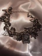 img 1 attached to 🐾 Mythical Fairytale Lucky Charm Bracelet with Celtic Cat, Cross, Moon Face, and Leaf Accents by RechicGu review by Cardell Haynes