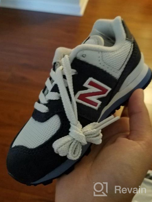 img 1 attached to 💯 Classic Style Meets Comfort: New Balance Kids' 574 V1 Lace-Up Sneaker review by Jay Brock